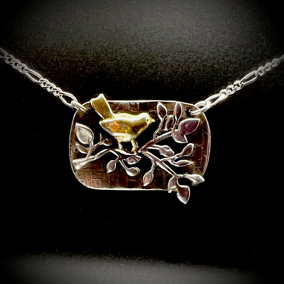 A 14k Gold Bird on Sterling Silver Necklace